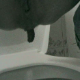 A girl squats over a toilet and takes a shit in several different scenes. About 5 minutes.